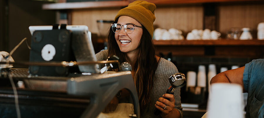 Young barista at work.