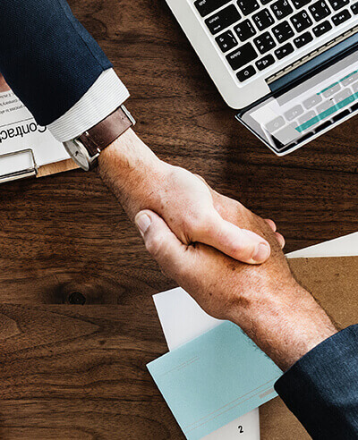 Insurance Broker Skills Businessmen shaking hands