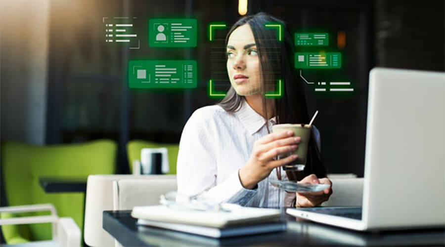 Facial recognition software around a woman's face.