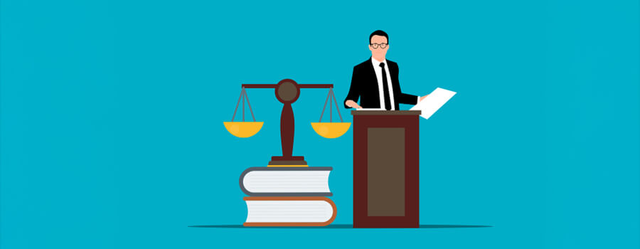 Vector of lawyer standing behind a lectern with two large books and some scales.