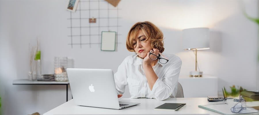 Woman looking at i-mac.