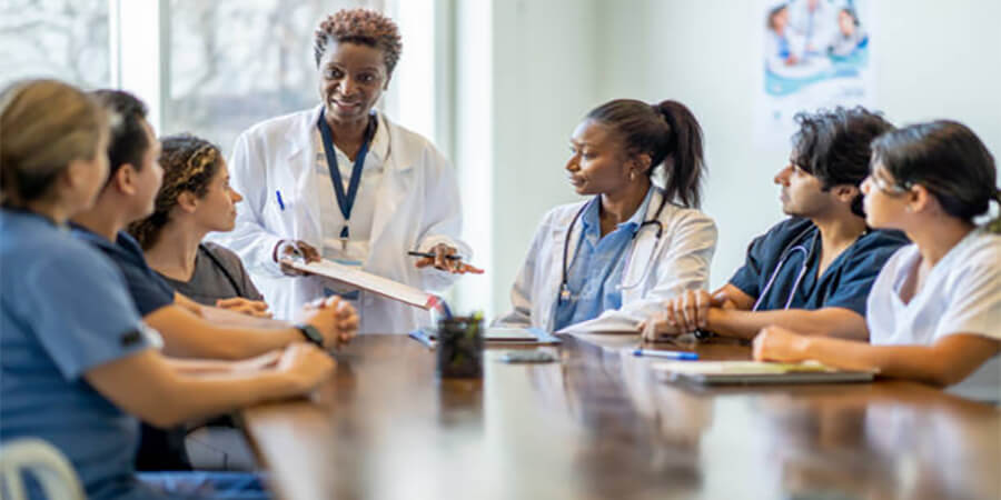 A group of medical professionals in a training session.