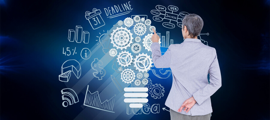 Man pointing at cogs on a graphic depicting problem solving.