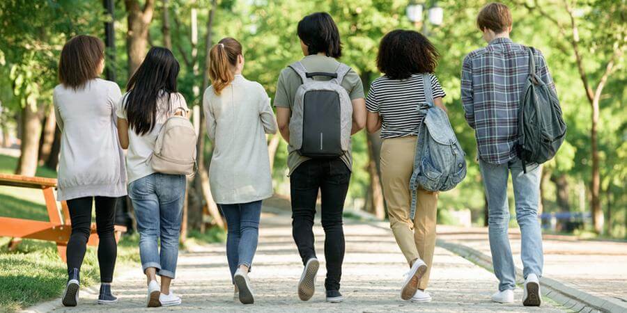 A group of students walking away.