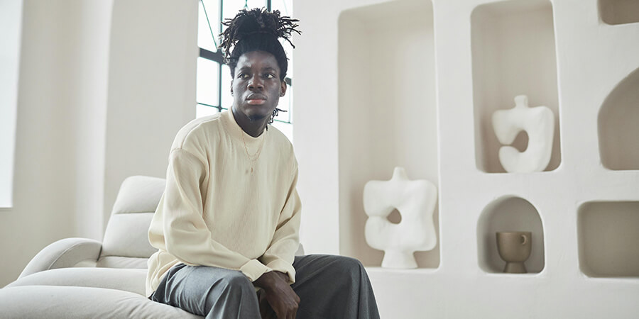 Person waiting in a modern room.