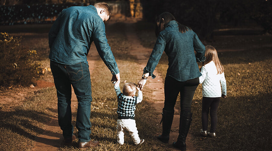 Young family out for a walk.