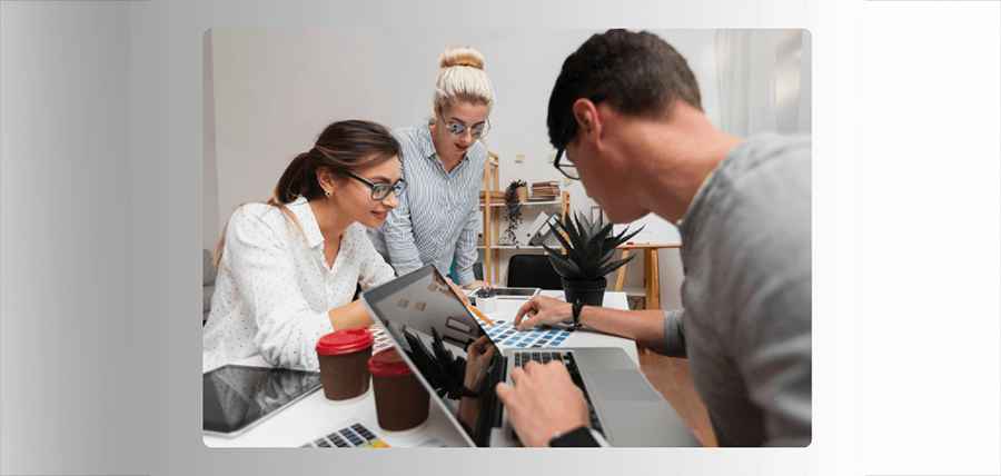 Group of people analysing data.